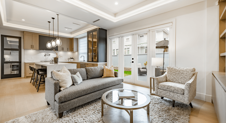 Modern open-concept living room and kitchen.