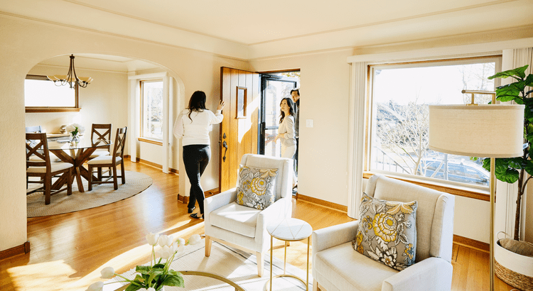 Welcoming guests into a bright living room.