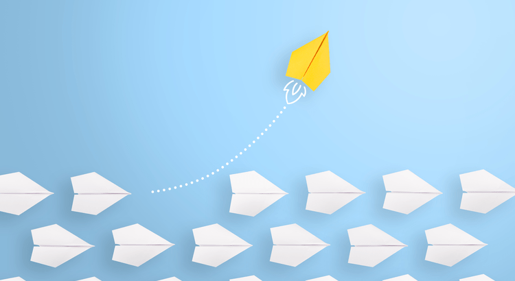 Yellow paper plane diverging from white planes.
